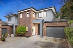  2/251 Elgar Road Surrey Hills VIC 3127 Set back peacefully at the rear and a close walk to Wattle park, this contemporary home delivers a superb combination of low maintenance luxe living. Designed with a stylish interior with chic modern spaces offering a separate lounge room which can be turned into a 4th bedroom with ensuite. Open plan living and dining with gourmet stone kitchen, stainless steel appliances , floor board through out and extending out to a private treelined deck perfect for entertaining or relaxing. Zoned upstairs are three bedrooms, master with ensuite and luxurious bathroom with freestanding bath and tiles to ceiling. Appointed with heating, cooling, security alarm, downstairs powder room, laundry and remote garage with internal access. Ideally positioned near bus services on Elgar Road, zoned for Roberts McCubbin Primary and Box Hill High School, with seamless access to Box Hill Central, the Eastern Freeway/Eastlink, Aqualink Box Hill, Box Hill TAFE and Hospital, Kingswood College, Deakin University, city-bound trams, Surrey Hills Train Station. 