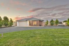  3 Retreat Court Irymple VIC 3498 $589,000 - $645,000 Positioned on a grand half acre allotment and surrounded by other quality homes is this near new property. An immaculate four bedroom home built by well renowned builders UBS in Dec 2018; finished off with stylish fixtures & fittings and highlighted by a truly large kitchen. Neutral tones are offered throughout, you've got a modern façade and popular vinyl planks through your entry way to the living zone. With three phase power connected this home is also ideal for the tradie. In the heart of the home sits an oversized kitchen with walk in pantry, standalone island bench, double sink to the side below window and a large 900mm gas cook top & electric oven. This space views your living zone and flows out to outdoor entertaining whilst viewing a neat landscaped yard with automatic irrigation. Creature comforts of ducted reverse cycle heating/cooling, town water, town sewerage & natural gas are all included. Your yard is cleverly designed to keep the kids & pets away from your monster 17.5x7x3m shed with a dedicated point of access and space for an array of vehicles. Part of this shed in enclosed, lined & currently set up as a salon, with hot & cold water connected, just use your imagination for what could be set up here! All of your in town conveniences are offered within an out of town lifestyle, yet just 10 minutes to Mildura's Fifteenth Shopping Precinct! 