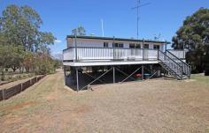  38 Blanchs Road Thangool QLD 4716 $279,000 This high set home located only 10* minutes from Biloela, is elevated to catch the breeze. With front and rear timber decks that wrap around the home, you can admire the fantastic views from all angles and enjoy the space that the allotment provides. The home boasts a combined dining and modern kitchen with a breakfast bar, electric cook top and oven, dishwasher space and is finished with sleek laminex bench tops. Carpeted, air-conditioned living room. Three bedrooms, with two of the rooms featuring split system air-conditioners and built-in robes. A tidy bathroom with a separate shower and bath. Underneath the home is fully concreted, includes your laundry space and offers plenty of room. The powered shed provides excellent space for storage or to utilise as a home gym. Additionally, there is a secured single carport attached. The home is set on a fully fenced, 3032sqm* allotment, providing privacy and tranquility. Sit back, relax, and enjoy the lifestyle that this high set home offers. Additional features: Town water Rainwater tank (external use) Ceiling fans throughout 