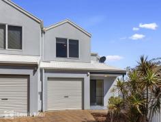  1D Mozart Court Somerton Park SA 5044  The home is split over two levels and offers 3 good size bedrooms and a centrally located bathroom all on the upper floor. The main bedroom and bedroom 2 both have built in robes. The lower level consists of the light filled kitchen, laundry, living and dining spaces. The kitchen is a great size with gas cooktop and electric oven. The reverse cycle air conditioning and gas instant hot water provides comfort all year round. There is a lock up single garage with internal access, plenty of storage including under the stairs. The entertaining area is located off the open plan kitchen / dining area. The flat roof covered veranda allows for entertaining regardless of the weather. Both the front and rear yards are a manageable size with great established plantings. 