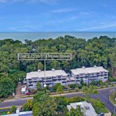  2/110  Moore Street Trinity Beach, QLD  4879 UNIT FOR SALE IN TRINITY BEACH Great Apartment by the Beach! 2 Beds  2 Baths  1 Car Just one street back from the iconic Trinity Beach you will find this stylish & modern 2 bedroom, 2 bathroom apartment. Offering single level living with a modern kitchen with stone bench tops and ample storage. Showcasing a spacious light airy interior, the inside merges seamlessly with your outdoor living zones, offering a generous sized balcony that leads directly down to your own private fully fenced courtyard. The master bedroom offers a walk through robe, direct access to the balcony and an ensuite with his & her basins. The second bedroom features a built in robe and is conveniently located next to the main bathroom. In this fantastic apartment you will also find an office or massive storage area. Property Features: Well-appointed modern kitchen with stone bench tops Large open plan living & dining area that looks onto a spacious outdoor balcony with mountain views Air-conditioned throughout Plenty of cupboard space - perfect for storage Secure undercover car parking with storage area Sparkling pool and BBQ/outdoor entertaining area With a gated carpark, secure storage room, BBQ area & sparkling in ground pool "Ocean Sands on Trinity" has all the facilities for you to enjoy. Ray White Smithfield Contact Rebecca Butson on 0406 537 579 for more information or to book an inspection. Parking: 	 1 garage space Bedrooms: 	 2 Bathrooms: 	 2 