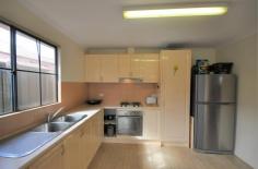  5/23 McLennan Drive Newman WA 6753 $249,000 Welcome to your new home... Why pay you Landlord's mortgage, when you can pay off your own! This villa is as spacious as many standard 3 bedroom homes in Newman. Located at the rear of a common drive way, it is one of only 10 units in the entire complex. Designed with unique bay windows, unit 5 offers a very light and bright combined kitchen/dining room, a separate lounge room and three good sized bedrooms. The master bedroom has an impressive walk-in robe and direct access to the bathroom, providing an ensuite type of effect. All rooms are serviced by good quality split air conditioning and new wood look vinyl plank flooring has recently been laid in high traffic areas. This three bedroom villa offers all the modern conveniences you'll ever need and want: • Three bedrooms with a centrally located bathroom • Spacious living areas • Split system air conditioning in all rooms • Rear under cover patio area and back yard • Separate lounge room • Light and bright full kitchen with adjoining dining room • Vertical blinds throughout the property • Nautical coloured bathroom which offers a full sized bath tub and separate shower • Paved drive way with an under cover parking space for one vehicle • Safe and secure strata complex 