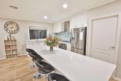  3 Retreat Court Irymple VIC 3498 $589,000 - $645,000 Positioned on a grand half acre allotment and surrounded by other quality homes is this near new property. An immaculate four bedroom home built by well renowned builders UBS in Dec 2018; finished off with stylish fixtures & fittings and highlighted by a truly large kitchen. Neutral tones are offered throughout, you've got a modern façade and popular vinyl planks through your entry way to the living zone. With three phase power connected this home is also ideal for the tradie. In the heart of the home sits an oversized kitchen with walk in pantry, standalone island bench, double sink to the side below window and a large 900mm gas cook top & electric oven. This space views your living zone and flows out to outdoor entertaining whilst viewing a neat landscaped yard with automatic irrigation. Creature comforts of ducted reverse cycle heating/cooling, town water, town sewerage & natural gas are all included. Your yard is cleverly designed to keep the kids & pets away from your monster 17.5x7x3m shed with a dedicated point of access and space for an array of vehicles. Part of this shed in enclosed, lined & currently set up as a salon, with hot & cold water connected, just use your imagination for what could be set up here! All of your in town conveniences are offered within an out of town lifestyle, yet just 10 minutes to Mildura's Fifteenth Shopping Precinct! 