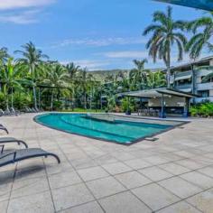  108/57-65  Paradise Palms Drive Kewarra Beach, QLD  4879 UNIT FOR SALE IN KEWARRA BEACH Dual Key Apartment Opportunity! 2 Beds 2 Baths 2 Cars Ray White Cairns Beaches are excited to present to the market an outstanding opportunity to purchase apartment 108/57-65 Paradise Palms Drive. Attractively located, providing relaxing views of the pool and garden areas from the balcony. The apartment offers 2 bedrooms and 2 ensuite bathrooms in a dual key style format and an overall 138 m2 in size. Unit 108A is a full 1 bedroom unit, displaying granite bench tops to the kitchen, Island bench and excellent appliances. Plenty of room exists for relaxed comfortable living, with open plan lounge and dining area. Moving out on to the private balcony, sit back and enjoy drinks and a bbq whilst overlooking the resort style pool, gardens and communal bbq area. Unit 108B also overlooks the pool and gardens from its patio. The unit itself feels like a luxury hotel room with a spacious master bedroom and luxe ensuite bathroom. The unit is accessed through it's own private entry or inter-connecting door making it ideal for letting opportunities. With plans in place to create a waterpark, parklands and a certified enviro development, the area is being described as the "New heart of Cairns Northern Beaches". The apartment offers - Great rental income. Car parking both undercover and outside. Opportunity to live in one side and rent out the other. Locked storage in garage area. Amazing resort style pool and bbq area. Access to Paradise Palms pools, restaurant & facilities on your door step! Ray White Smithfield Contact Derek Mahony on 0422 301 149 for further information or to arrange an inspection. *Unit A is currently tenanted and requires 24 hours notice. Unit B is currently let periodically on Airbnb for short term rental. Building: 	 138m² Parking: 	 1 garage space and 1 off street park Bedrooms: 	 2 Bathrooms: 	 2 