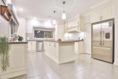  9 Karalanza Drive Mildura VIC 3500 $599,000 - $658,000 Principal & Elite Sales Agent at Ray White Mildura Damian Portaro is proud to present for sale this stunning GJ Gardener home built with the modern family in mind. Complete with a salt chlorinated pool, a media room, solar system and an open-plan layout, this home is ready for contemporary lifestyles. High ceilings welcome you to the open-plan family, dining and kitchen areas that spill out to the outdoor alfresco. Easy care tiles flow underfoot while the home chef will love the suite of stainless-steel appliances, ample stone benchtops, an island and plenty of storage space. The alfresco, with views over the in-ground heated saltwater pool, is an entertainer's haven where you'll be able to sip cocktails while the kids play in the fully-fenced backyard. For the DIY enthusiast, a 6x6 meter shed awaits all your project desires. There are three guest bedrooms, all with built-in robes and within easy reach of the main bathroom while the master suite includes luxe extras such as a walk-in robe and ensuite. Located within walking distance to Mildura South Primary School, local parks, shops, and restaurants, you'll have everything you need close by. 