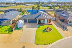  8 Marsanne Drive Moama NSW 2731 $900,000-$960,000 This immaculately presented property will impress the most fastidious buyer. Set on approx 1288sqm allotment there is good side access to the rear yard for those that would like to add a shed to the property. The impressive entry leads you into the master suite which offers a stunning ensuite with a bath and walk in robe. There are also three more double bedrooms with ample robes and a spacious study. As you delve further into the home you will find a chefs kitchen well appointed and of course there is a full butlers pantry. This area is the heart of the home and overlooks the dining and family living area and also leads you out to the under cover alfresco area and the focal point of the rear yard is the inground swimming pool. Gardens are beautifully and easily maintained and I can imagine family Christmas with kids running around the yard and the annual family cricket match being afternoon entertainment. Room for a caravan boat and vehicles plus 6kw solar to minimise your bills. 