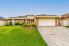  64 Streeton Dr Metford NSW 2323 $680,000 – Fantastic offering in todays market and located in an area experiencing substantial growth! – Tightly held location and surrounded by homes of similar quality and style – Offering four large bedrooms, two with built in robes, main suite with walk in robe and ensuite – The high quality kitchen is the centre piece of this home and overlooks the internal and external living spaces. It features quality appliances, walk in pantry and island bench – Ducted A/C and ceiling fans are featured throughout, making this home comfortable all year round – Outside, the undercover entertaining area offers sensational entertaining potential – The backyard is very manageable and has a garden shed – Double garage equipped with electric roller door and additional small roller door to access the backyard – Close to Greenhills Shopping Precinct, New Maitland Hospital and only a short stroll to both Maitland TAFE and Metford Train Station 