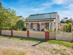  11 Hunter St Rutherglen VIC 3685 Originally built circa 1890 is this original miners cottage boasting both period traits/characteristics of its era and modern features throughout its floorplan. Comprising of three (3) bedrooms, a cosy lounge room, ‘country’ style kitchen/meals area with electric appliances and two (2) bathrooms, one highlighted by a fantastic spa bath. The outside is surrounded by ‘cottage’ style gardens and is carefully planned into separate areas. One with low maintenance gardens, undercover dining/entertainment area, garden shed and outside toilet. The second area is at the rear and is chook and duck friendly, also offering access from a lane, single lockup garage and seventeen (17) individual raised veggie garden beds that have been set up on a crop rotation using permaculture principles and drip irrigation system. Other features - Original wood burning stove - Electric split system heating and cooling - Overhead fans to all bedrooms - Rainwater tank for gardens and surrounds - Multiple fruit trees 