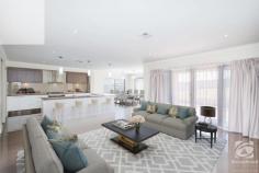  21 Thorneycroft Avenue Wodonga VIC 3690 $725,000 to $750,000 With a commanding and stately presence, this 2011 built home is sure to grab your attention. Situated on a spacious 855m2 block, offering four bedrooms, two and a half bathrooms and four living areas, this impressive home has been elegantly designed to accommodate the needs of an expanding family. As you enter the home through the double wooden doors, the impressive foyer greets you with an elegant staircase and stunning polished tiles. You will find the formal lounge room to your left and the home office or study to your right, both bathed in natural light, overlooking the quiet street front. The grand staircase leads to a central living space upstairs, with all four bedrooms and the main family bathroom adjoining. Space is luxury, and this master suite will not disappoint. With double glass doors opening onto the private balcony, a huge walk-through robe and a generous, luxury ensuite, this master is the pinnacle of comfort. This kitchen is a chef's dream, with ample storage options, a huge walk-in pantry, stainless steel appliances, including a 900mm wide oven, and stunning stone benchtops. The spacious open plan kitchen, living, dining flow out through glass doors to the undercover alfresco area. With space for all the family, the generous rumpus room is versatile and would make the perfect kids play area or home theatre. The backyard is very low maintenance with plenty of scope for a future pool or shed (STCA). The double lock-up garage can be accessed via the internal door through the laundry or backyard through the single rear door. With 321m2 of living space, what more could you ask for? 