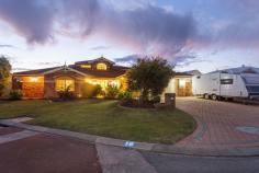  16 Sao Jorge Grn Secret Harbour WA 6173 $699,000 Enjoy glorious sunsets with views up and down the award winning Secret Harbour Golf Course ,while you relax on your balcony, or share fun times at casual get togethers with family and friends. This property has so much to offer!! Location wise, this warm and inviting home sits amongst other quality homes in the sought after “Golf Course Island Estate” with its quiet meandering streets and close proximity to the beach, surf club, golf club, shopping precinct and public transport. Not only does this well loved home have plenty of room for the whole family, there is also extra parking space for a caravan or boat. With loads of backyard, there is room for a pool, trampoline or even a granny flat. The large traditional floor plan provides ample opportunities for you to apply your own personal style and utilise the spacious rooms to suit individual requirements. The upstairs living area would be ideal for a teenagers retreat, studio, or games room. The views and feeling of space outside is a rarity these days as blocks of this size are becoming so hard to find. Some of the features of this home include: • Double Storey with wide golf course views • Master bedroom with golf course outlook & modern Ensuite • 2 spacious bedrooms 1 on the ground floor & 1 on the upper floor • 4th bedroom/guest room with Ensuite • Spacious family bathroom & laundry • Formal lounge room and formal dining room on ground floor • Open-plan kitchen, breakfast nook and living room with views • Large living room/games room with bar and access to the balcony • Double lock-up garage • Powered workshop area, with driveway parking for a caravan or boat • Large outdoor entertaining area and sheltered courtyard • Great size backyard with room for a pool or kids swings • Massive 837 sqm block backing onto golf course • Council Rates Approx $1136.00 PA • Water Rates Approx $2200.00 PA The list of features goes on and on…… What a lovely home this will make for the lucky new owners. Spacious inside and out with a warm and homely feel, all in a fantastic quiet location. 