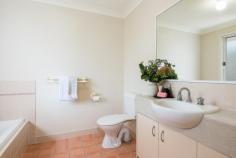  13 / 27 Camille Crescent Wynnum West QLD 4178 $400,000 Imagine a gorgeous three-bedroom townhouse that’s utterly peaceful, and yet only five minutes’ drive to Wynnum Plaza. Just nine minutes to the boats and sea air at Manly Esplanade. Within walking distance of multiple, leafy parks. Imagine airy, bright rooms, a delightful courtyard, absolute comfort and security. Welcome to 27 Camille Crescent. It’s a gated community, surrounded by beautifully-kept homes and gardens. There’s an attractive shared pool and entertainment area, maintained by a full-time manager who lives on-site. This is fantastic, fuss-free Queensland living—ideal for busy people—with all the benefits of great amenities without the hard work. Drive in to your remote-controlled garage. Peace after a hectic day. The spacious living and dining area flows to a large, fully-fenced courtyard. It’s very private: a perfect place to entertain, or just relax. There are cool tiles underfoot in the kitchen and dining area, but for those extra-hot summer days, the living area is air-conditioned. Upstairs, that sense of light and space continues. All three bedrooms are fully carpeted, with built-in robes and ceiling fans. A large en suite bathroom and additional robe adjoin the main bedroom. In the tiled main bathroom there’s a full-size bath and separate shower. In excellent condition throughout, this lovely townhouse represents a superb opportunity to secure a home of quality in an ideal location. It’s just over twenty minutes’ walk to Lindum station, with speedy rail straight to the CBD. Multiple schools are less than 3kms from your door, including Wynnum West State School, Brisbane Bayside State College, Iona College, Moreton Bay College and more. There’s a childcare centre (Goodstart) just a few minutes’ walk away. Camille Crescent has easy access to the Gateway Motorway for a quick run to the coast. Brisbane airport is just fifteen minutes’ drive away. 