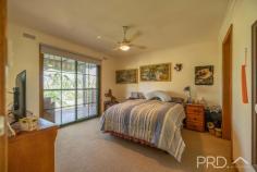 72 Carey Street Tumut NSW 2720 $590,000 - $650,000 - Set on a total land size of approximately 2818m2. - Two homes on a single title, both currently rental homes. - "House 1" - Four bedrooms, ensuite home all with built in robes, gas bayonets, wood heater + evaporative air conditioner + ceiling fans, and split system air conditioner. - "House 2" - Three bedroom home with built-ins, ceiling fans, split system air conditioner and gas bayonets. - Both have private verandahs and entertaining areas. - Three vehicle carport and large colourbond shed. - A very secluded, quiet location. 