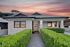  12 Rogers Street Roselands NSW 2196 A paragon of modern design excellence with intelligent inclusions at every turn, this impeccable luxury residence stands in a league of its own. Showcasing astute planning, meticulous construction integrity and high caliber finishings, it delivers a distinguished lifestyle of superior comfort for the growing family. Superbly positioned on a tree-lined street in the heart of Roselands, this exceptional home has been built with expert and skill for seamless indoor-outdoor living, easy entertaining and optimal natural light flow. - 3 immaculate bedrooms with double connection ports and mirrored built-in wardrobes - Master bedroom with walk-in wardrobe and luxury en-suite with top quality fittings - Expansive open living area with one-of-a-kind epoxy matte floor finish - Contemporary open plan kitchen with Caesarstone benchtops, 5-burner gas cooktop & Miele appliances with bi-fold kitchen servery adjoining to outdoor alfresco entertaining area - Stunning Marquina Black Marble fireplace, kitchen island and wraparound splash backs - Two designer bathrooms with Geberit in-wall cistern systems, oversized bathtub and rain shower heads - Premium BBQ area with commercial rangehood, coal & gas facilities, Basalt stone tiles - Separate professional office/study room with built-in cupboards - Solid, Red Cedar Timber doors and Merbau hardwood timber floorboards - Year-round comfort with ducted air-conditioning and energy saver downlights - Built-in cable sound system including outdoor speakers for ambient effect - Massive roof attic storage across encompassing half the internal house area - Impeccably landscaped front and back gardens with lush green hedges - Chimney extraction system from fireplace, kitchen and outdoor BBQ zones - Natural ventilation louvre roof system, solar panels and Boral terracotta tiles - CCTV intercom system, remote-controlled sliding gate and double garage with carport - Separate internal laundry with second WC - Footsteps to Roselands shopping, local schools, transport connections and Canterbury Golf course and Clemton Park parklands 