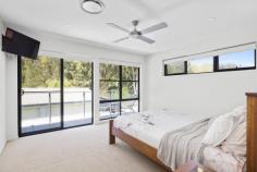  21 Taylor Road Taylors Beach NSW 2316 A short 350m walk to the water's edge and sitting on a level parcel of land is this beautiful 5 bedroom family home. Backing onto and directly opposite native bushland, this home is the epitome of coast meets countryside. Escape the hustle and bustle of the town centre with a quick 7km drive to your peaceful sanctuary whilst being just 27km from the Newcastle airport. A great location offering a fantastic home as well. Upon entry to this beautiful home, you will be impressed by two living areas, a large kitchen and dining room, 2 bedrooms, main bathroom and study. Finished with modern fixtures and fittings and offering easy living on one level there is ample space to entertain family and friends. Upstairs is the master bedroom with an ensuite and walk in robe that opens to a private balcony. On this level you will also find the fourth bedroom, powder room and another loungeroom/retreat that can also double as the fifth bedroom. There is certainly no shortage of accommodation or space to sit back, relax and enjoy the serenity of 21 Taylor Road. This great property truly provides the essence of family living and all the essential features to make day to day life stress free. With sufficient space, generous storage and a beautiful grassy yard together with an undercover entertaining area, this home just keeps on delivering. Key Features: - Multiple living areas - Irrigation - C-Bus home automation - Floor heating - Ducted air con - Miele appliances, gas cooktop, Caesarstone bench tops - Automated open and closing pergola roof - Ceiling fans throughout.. 