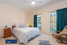  13 Ward Ave Greenmount WA 6056 $799,000 The best place to begin the new year is this big family home with generously proportioned rooms, a central open-plan living zone, and a sought-after Greenmount address. The 2000-built brick and iron home, arranged across two storeys, boasts a separate home office, a backyard with ample room to run and play and an upstairs verandah that is perfect for watching the sun go down – cool drink in hand. • 	 5 bedrooms 3 bathrooms • 	 2-storey brick and iron • 	 Separate study/h office • 	 High ceilings throughout • 	 Double jnr beds BI robes • 	 Big laundry/utility room • 	 Paved drive 2-car carport • 	 4.2 kW solar panel array • 	 2028 sqm gently graded • 	 Sought-after Greenmount The entry-level floorplan of this generous family home comprises a spacious and well-appointed kitchen and an open-plan family/meals area with a verandah spanning the central living zone.  Double front doors open to an expansive entry hall with high ceilings and a spacious home office, ideally positioned for at-home meetings and uninterrupted work to one side. A gas log fire in the family room creates a cosy focus for nights at home during the cooler months. A timber mantle, decorative feature tiles, ornate cornicing, and a ceiling rose bring a timeless style and reassuring sense of home to this large, welcoming space. In the kitchen, a family-sized oven with a six-burner hob, grill, oven and warming oven waits, ready for weeknight meals, celebratory feasts, or comforting cheese on toast on a Sunday night. Jarrah cabinets – including an appliance nook – are surrounded by a cream tile splashback and a cream laminate benchtop. Three double-size junior bedrooms, each with built-in robes and soft carpet underfoot, share the family bathroom and separate powder room. The king-sized main suite features a walk-through robe and generous ensuite with shower, vanity and WC. Downstairs, a double bedroom, living area with slow combustion fire, and a bathroom with shower, vanity, and WC create an ideal zone for older children or guests. A large laundry/utility room could be adapted as a kitchenette to create self-contained accommodation under the main roof. Outside there is ample space for kids and pets to run around, create veggie gardens or keep chickens. The gently graded 2028 sqm features a large lawn stretching from the downstairs verandah to a neatly clipped hedge. Ward Avenue is a prime Greenmount address, prized for its friendly family atmosphere, proximity to a choice of schools, and private, elevated position. Family life can be hectic, unpredictable, exhausting; this large, flexible home offers a calm haven that will shelter and nourish your family for generations. To arrange an inspection of this property, call Cheryl New on 0439 961 192. 