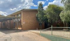  14/20 Leichhardt Terrace Alice Springs NT 0870 $232,500 Within a short walk from the CBD, this first-floor unit is close to cafes, restaurants, and shops. The large kitchen offers ample bench and cupboard space with electric cooking. Adjacent the good-sized living and dining area provide room to move and large windows letting natural light shine through. Both good-sized bedrooms are carpeted and feature built-in wardrobes and air conditioning. Main features include: - 2-bedroom 1-bathroom - Large kitchen - Air-conditioning in bedrooms - Built-in robes - Short walk from the CBD.. 
