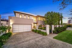  32A Reynolds Road Applecross WA 6153 With its wide street frontage, this impeccably presented modern home has alluring street appeal and style with designer finishes and quality construction that has been immaculately maintained. The versatile floor plan, and option for a ground floor bedroom, makes this stunning home ideal for families and downsizers alike to enjoy the excellent amenity all within easy walking distance. This gorgeous home has been cleverly designed to maximise natural light with a functional layout. The residence has been privately set back from the road and features a securely gated front yard that leads to the portico and foyer entry. The ground floor includes attractive Blackbutt timber flooring in the open plan kitchen, meals and living area which flows onto the rear decked area. The ground floor also includes a ground floor bedroom with separate bathroom, separate laundry as well as large secondary living area surrounded by a lush garden outlook. The kitchen features stone bench tops, quality appliances including five burner gas cooktop, wide 900mm oven and inbuilt coffee machine. Upstairs you will find the oversized master suite with large walk-in robe and generous ensuite bathroom featuring attractive neutral finishes including full height tiling and double vanity. The additional three upstairs bedrooms are generously sized, feature high ceilings and all include built in wardrobes and fans. There is also another open living/ sitting/ study area upstairs at the landing as well as an additional bathroom which also includes full height tiling and a bath. Additional features of this home include Daiken ducted reverse cycle air-conditioning throughout, new gas hot water system, timber shutters, excellent storage and lock up double garage plus space for extra vehicles on site and established easy care reticulated gardens. This convenient location is just a short ten minute stroll to the popular Applecross Village café strip, riverfront foreshore, Applecross Primary School, Woolworths supermarket, medical centre and just minutes to Gairloch Reserve and public transport. For further details please contact Renee Banovich on 0409 647 341. 
