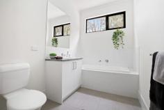  18 Swan Court Tonsley SA 5042 $495,000 - $540,000 Future living at its best, this beautifully presented townhouse offers you everything you could ever need or want in a modern home. Situated in this unique location with everything close by, including the train line a few minutes’ walk away, major shopping Centres Marion and Pasadena only minutes away, Flinders Hospital and University are close by, with quick access to the Southern Expressway and a 10-minute drive to local beaches. The lower level consists of single garage with internal access and remote-control roller door. The main living area offers large open plan living/dining and kitchen with island breakfast bar and stainless-steel appliances including dishwasher. Flowing from the living /dining area is a rear paved courtyard, ideal for small pets as well as excellent all year round outdoor entertaining. The upper level consists of; the main bathroom, the main bedroom with built in robe, large ensuite and a balcony and the second bedroom also with a built-in robe. To complete the upper level there is also a living area with natural light effect and a second balcony with views. Other features include: * Ducted reverse cycle heating and cooling unit. * Self-closing quality screen doors. * Modern downlighting. * High 2.7m ceilings. * Modern tiling. * Neutral toning’s. This wonderful low maintenance near new home will provide you with everything you could need, and with the quality of the finish and the vendors added extras, you will feel at home. This uniquely situated property is nestled at the end of the Village with a rare back yard set amongst the trees. 