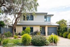  7 Hotham Street Frankston South VIC 3199 $860,000 - $946,000 Sophisticated in style and effortless in practicality, this near-new three bedroom home has the perfect balance of high-end design and low-maintenance living. Perfectly positioned at the highest point on prestigious Oliver's Hill, overlooking the tranquil Humphries Road Water Reservoir in a peaceful and tree-lined pocket of Frankston South, Mount Eliza Village and all the attractions of the Mornington Peninsula are only moments away. The sensational front garden, framed by a mature gum, sets the idyllic tone for this light-filled modern home. Greeted by a welcoming entrance, the home is quick to reveal the stylish lounge looking out to the front garden. An impressive and bright stone-topped kitchen featuring quality appliances and ample storage overlooks the dining area. The gorgeous north-facing rear deck, which is framed by easy-care resort-style gardens and hydrotherapy spa, provides a tranquil private sanctuary in which to unwind and relax. Upstairs, discover a master bedroom with stylish ensuite, walk-in-robe and tree-framed views, plus two other bedrooms with leafy outlooks, one with views of Port Phillip Bay, both including built-in-robes, and a family bathroom with quality finishes. Additional features include gas ducted heating, reverse cycle split-system air conditioning both upstairs and down, separate laundry and adjoining toilet, garage with internal entry, and still under new home warranty. Fibre to the premises Internet (FTTP) completes the package, providing the perfect vehicle for easy working from home and reliable streaming. Such an immaculately maintained and well fitted-out new home is a rare find in this established neighborhood, and there is nothing to do but move in and enjoy the bayside lifestyle. Located in the coveted Frankston High School zone, the home also offers easy access to the Melbourne train line, boutique cafes and local reserves and playgrounds. Should you require any further information, please do not hesitate to contact Ashley Weston on 0439 101 677 or Jessica Page on 0400 799 396 anytime. Please note Photo ID is required for all inspections. 
