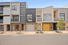  18 Swan Court Tonsley SA 5042 $495,000 - $540,000 Future living at its best, this beautifully presented townhouse offers you everything you could ever need or want in a modern home. Situated in this unique location with everything close by, including the train line a few minutes’ walk away, major shopping Centres Marion and Pasadena only minutes away, Flinders Hospital and University are close by, with quick access to the Southern Expressway and a 10-minute drive to local beaches. The lower level consists of single garage with internal access and remote-control roller door. The main living area offers large open plan living/dining and kitchen with island breakfast bar and stainless-steel appliances including dishwasher. Flowing from the living /dining area is a rear paved courtyard, ideal for small pets as well as excellent all year round outdoor entertaining. The upper level consists of; the main bathroom, the main bedroom with built in robe, large ensuite and a balcony and the second bedroom also with a built-in robe. To complete the upper level there is also a living area with natural light effect and a second balcony with views. Other features include: * Ducted reverse cycle heating and cooling unit. * Self-closing quality screen doors. * Modern downlighting. * High 2.7m ceilings. * Modern tiling. * Neutral toning’s. This wonderful low maintenance near new home will provide you with everything you could need, and with the quality of the finish and the vendors added extras, you will feel at home. This uniquely situated property is nestled at the end of the Village with a rare back yard set amongst the trees. 