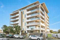  101/6 Beatson Street Wollongong NSW 2500 Impressively sized and crisply appointed, this quality courtyard apartment offers an idyllic urban retreat in one of Wollongong's premier pockets. Designed for elegant impact, interiors feature generous banks of floor-to-ceiling glass, a sleek snowy-white kitchen with stone benchtops, and chic alfresco flow from both the lounge and dining areas. The main bedroom boasts its own courtyard and a spacious ensuite; sleek new floating floors carry the home's stylish theme throughout. Just a stroll away from cafes and City Beach, this is an outstanding opportunity for comfort and convenience. Features: Beautifully bright + private with distant escarpment views Full width all-seasons courtyard, leafy attached garden Gas-equipped kitchen with dishwasher and breakfast bar Main bath with freestanding tub; separate internal laundry Built-in robes throughout, intercom, secure parking space Easy walk to golf course, MacCabe Park, transport + CBD. 