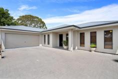  75A Cungena Avenue Park Holme SA 5043 $550,000 - $590,000 With its contemporary style, low maintenance layout and prime Park Holme position, this flawless courtyard is just the one you’ve been looking for. Previously earning a healthy $450 per week rental return, this north-facing beauty offers an equally excellent opportunity to investors along with those looking to downsize, break into the market or young families with a focus on lifestyle. Within walking range of a myriad of local parks and reserves, with shopping, transport (bus, Ascot Park Railway Station), learning centres and schools all at your fingertips. Less than 10kms from the CBD and just 5 from Glenelg’s bustling seaside and beautiful beaches. Opening onto a spacious open plan living and dining upon entry, sliding doors reveal a gorgeous alfresco under the main roof, all overlooked by the sleekest of cooking quarters. Neutral bench tops and splash backs complement white cabinetry alongside a huge gas cooktop, dishwasher, double undermount sink and breakfast bar in a kitchen any home cook will be happy to create in. Three well-proportioned bedrooms include a generous master with wall-to-wall robes, serviced by a central bathroom with shower, bath and separate powder room. You’ll love: – Zoned ducted reverse cycle air conditioning throughout – Built-in robes to all bedrooms – Separate laundry with great storage – Secure double garage with internal access + extra off-street parking – Easy care backyard with paving, lawn & established garden beds Perfectly presented and feels just like new. Come and see this one for yourself. 