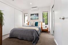  2/36 Genista Street Frankston South VIC 3199 $760,000 - $836,000 Offering a supreme example of an effortless lifestyle combined with ample light-filled spaces, this immaculate three-bedroom villa is the ultimate expression of sleek, low-maintenance living. Ideally located amidst the leafy streets Frankston South is so well known for, close to tranquil Sweetwater Creek Nature Reserve, Towerhill Road Shops, and set in the highly sought after FHSZ. Showcasing a stunning monochromatic colour palette off-set by minimalistic gardens, this striking abode offers peaceful permanent living, cleverly using every corner of the 224sqm (approx.) allotment to deliver stunning spaces for breezy entertaining and the quintessential peninsula lifestyle. Encourage intimate family time in a cozy and sun-drenched open plan domain, where gleaming timber floorboards connect a bright entrance with a generously sized lounge, dining and kitchen area, complete with laundry access, breakfast bar and courtyard views; making this the perfect place to host guests, whilst remaining part of the festivities. Warmer months invite free-flowing entertaining through glass sliders, extending the internal lounge with a surprisingly spacious alfresco area, inclusive of vaulted ceiling and cafe blinds. Seamless connection to a tranquil courtyard completes this entertainer's haven with a designated fire pit. An adjoining accommodation domain reveals three bedrooms (BIRs), inclusive of master with ensuite, and all with views to the immediate gardens and stylish main bathroom and a private WC. Additional features include; Split system in master bedroom and living, garden shed and SLUG with alfresco access. Meticulous in presentation and the epitome of easy and convenient living, this gorgeous home will undoubtedly attract the interest of many. Central to all the spoils of the Mornington Peninsula and only moments to public transport options, enviable coastlines and easy freeway access. 