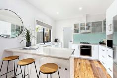  2/36 Genista Street Frankston South VIC 3199 $760,000 - $836,000 Offering a supreme example of an effortless lifestyle combined with ample light-filled spaces, this immaculate three-bedroom villa is the ultimate expression of sleek, low-maintenance living. Ideally located amidst the leafy streets Frankston South is so well known for, close to tranquil Sweetwater Creek Nature Reserve, Towerhill Road Shops, and set in the highly sought after FHSZ. Showcasing a stunning monochromatic colour palette off-set by minimalistic gardens, this striking abode offers peaceful permanent living, cleverly using every corner of the 224sqm (approx.) allotment to deliver stunning spaces for breezy entertaining and the quintessential peninsula lifestyle. Encourage intimate family time in a cozy and sun-drenched open plan domain, where gleaming timber floorboards connect a bright entrance with a generously sized lounge, dining and kitchen area, complete with laundry access, breakfast bar and courtyard views; making this the perfect place to host guests, whilst remaining part of the festivities. Warmer months invite free-flowing entertaining through glass sliders, extending the internal lounge with a surprisingly spacious alfresco area, inclusive of vaulted ceiling and cafe blinds. Seamless connection to a tranquil courtyard completes this entertainer's haven with a designated fire pit. An adjoining accommodation domain reveals three bedrooms (BIRs), inclusive of master with ensuite, and all with views to the immediate gardens and stylish main bathroom and a private WC. Additional features include; Split system in master bedroom and living, garden shed and SLUG with alfresco access. Meticulous in presentation and the epitome of easy and convenient living, this gorgeous home will undoubtedly attract the interest of many. Central to all the spoils of the Mornington Peninsula and only moments to public transport options, enviable coastlines and easy freeway access. 