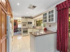  6 McCaskill Way Noranda WA 6062 A house is made of walls and beams, however a home is made of love and dreams. A saying no more evident than here at 6 McCaskill Way. Built for and offered for sale by its one and only owner, this charming country styled abode on a generous 700m2 block is the perfect place for your family to settle down & start their own memories. Nestled in a quiet family friendly street amongst neighbours who take great pride in their homes, you're instantly welcomed by the wrap-around front verandah that overlooks the front garden, the perfect spot to sit back, relax and contemplate the day gone by. Warmed by a feature brick fireplace with mantle and hearth, the large formal lounge and dining room feels both homely and inviting. The perfect place for the whole family to gather around and share stories, the adjoining dining room is ideal for family dinners or entertaining guests at your next dinner party. Through to the main ‘hub’ of the home, and the open plan concept design ensures no one misses out on the conversation. Generously proportioned to include a second living room (this time with a slow combustion wood heater), meals area and fully renovated ‘country style’ kitchen, the latter is definitely the centrepiece of the room. Upgraded to include granite benchtops, modern stainless steel appliances plus a plethora of built-in cabinetry, it’ll certainly impress the avid cook in your family. With glass sliding doors seamlessly connecting indoor/outdoor living, this an entertainers paradise. Just imagine, a balmy summer’s afternoon with your favourite beverage in hand, the kids enjoying a game of cricket on the expansive patch of lawn, and the sausages sizzling on the BBQ. Then when lunch is ready, everyone can gather under the huge covered patio and devour the feast on offer! Sound too good to be true? All that and much more can become a reality right here in your very own backyard! Back inside and sleep is made easy, with all 3 bedrooms generously sized and complete with mirrored built-in robes. Incorporating a separate shower and bathtub (perfect for the little ones), the original family bathroom is both neat and functional. A handy laundry with adjoining W/C round out the accommodation on offer. In terms of location, it's easy to see why the neighbours love calling McCaskill Way home! Just 10kms from the CBD, the closest bus stop is only a short stroll on Benara Road. Hawaiian's Noranda (home to the ever popular Esprezzo Cafe) is only moments away, whilst for bigger shopping trips the Galleria and Coventry Village are also not too far. For those active or who have furry friends, Lightning Park and Noranda Sporting Complex are only a hop, skip and jump away, plus you also have a number of superb schooling options close by. Sitting on a generous 700m2 block zoned R17.5/25, the property also offers possible development potential. Strategically positioning to one side of the block, and enjoying a generous 20.1m frontage, by removing the side carport and patio you potentially could create a new street front building block. (Subject to Council and WAPC approval). Fastidiously maintained by its one and only owner, 6 McCaskill Way has been a cherished family home for the past 39 years. Neat as a pin, and offering scope for you to add your own personal touches, harmonious family living awaits! 