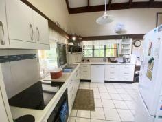 2 El Arish Mission Beach Rd Maria Creeks QLD 4855 $520,000 "Canelands" is nestled on a 4.72ha (11.8 acres) beautiful site which has est. 4/5 acres cleared and the balance of rainforest pockets and vibrantly coloured tropical gardens. The property enjoys a great location, being only 8 mins. from Mission Beach and a short drive to Tully and Innisfail. Cairns is 1.5 hours north. Some features include: - 2 large bedrooms, each with bathrooms plus a smaller office/3rd bedroom - A spacious mezzanine level for extra beds as needed - Incredibly strong construction with suspended reinforced concrete floor to the mezzanine section and solid Blue Gum timbers as rafters. - Wide, cool, tiled patios on 3 sides (up to 3m wide) - Main Bedrooms open out onto the patios - Modern kitchen with soft close drawers - Open plan lounge/dining/kitchen area flowing onto adjoining patios - Combined floor area of approx. 240m2 - Cool breezes in summer - Tropical fruit trees - Handy machinery shed est. 8 x 8m This region is a true tropical Paradise, with a 14km long pristine, coconut palm fringed beach, over a dozen lush tropical islands in the Great Barrier Reef Marine Park and World Heritage rainforest abounding. 