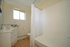  4/2-6 Roser Close Kearneys Spring QLD 4350 $305,000 Neat & tidy throughout, offering 3 bedrooms with built-ins, main with ensuite, open plan kitchen, dining & living. Bathroom with separate shower, 3 x WXC's, remote lock-up garage with internal entry, situated in a quiet street in a much sough after suburb, just a short stroll to K-Mart & all major amenities. A great entry level property at an affordable price. • Private Rear Courtyard • Air Conditioned Living Area • Security Screens • Gas Hot Water & Cooking • Currently Tenanted. 