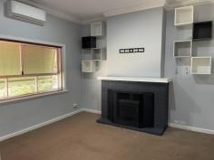  16 Turner St Northam WA 6401 $295,000 As you walk through the front entrance you are greeted with a hall way that has floorboards with vinyl coverings, on your left is the loungeroom with carpet floorings, wood fire & split air-conditioning. New modern open kitchen with melamine like marble bench tops including island/breakfast bear centred. 1st bedroom is spacious that features carpet flooring and slip aircon, 2nd bedroom features a built-in wardrobe, with carpet & split aircon. Bathroom features, toilet, vanity sink, shower and bath that has been renovated. Through the back door has laundry room on the left & sleepout on the right, could be used as the 3rd bedroom, office or storage room. Backyard features: Undercover porch! Lime stone terrace backyard 6m x 9m approx. double garage/shed with loft! with an extension undercover entertaining area! Vegie garden bed that is already set for you!! Fruit trees etc. Chook pen. 