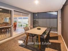  5 Straits View Dunsborough WA 6281 $665,000 One of only six homes in the street and opposite a delightfully landscaped park, giving you privacy from the other streets, this very well maintained home will impress. Once you have entered into the hall from the front door, you access a light filled open plan living room, dining area and kitchen. The room features high ceilings, downlights and has two stacker sliding doors which open out to the outside entertaining area and large covered alfresco. With attractive exposed aggregate floor and weather resistant café blinds on two sides, this is the ideal place to relax or entertain on summer evenings and becomes a warm place to be on cool winter days. Ducted reverse-cycle air conditioning throughout the house also keeps you cool in summer and warm in winter. The kitchen has everything that is needed with stone benchtops, 900mm appliances and a very large island bench, which can be utilised as a breakfast bar with double a sink and a dishwasher. The main bedroom is oversized with twin access to a huge walk-in-robe. The en-suite has stone benchtops, double vanities, an oversized shower area and separate WC. The two minor bedrooms are generous in size and have robes with double glass tinted sliding doors and are serviced by a bathroom with vanity, shower and bath. The garage has been built wider to allow for extra storage for toys such as surfboards, paddle boards and bikes. At the rear is a door which leads to an outside hot and cold shower and there is also a door to give direct access to the home. The residence has been carefully placed on the lot to allow for the full winter sun and protection from strong southerly winds and with a four-metre side access if needed to park boats or a trailer. 