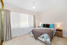  27 Merrifield Ave Kelmscott WA 6111 $300,000's This pretty as a picture 3-bedroom, 1 bathroom home is waiting for you! Perfectly located in a very sought-after location, with options galore for you to add your own special touches. Having one loving owner for its entirety, this spacious and well-maintained home on a HUGE 911sqm block of land offers room for a pool, an extension a cubby and loads of space for children and fur babies to run, play and laugh. This gorgeous home has also been recently painted and offers loads of special features such as air conditioning and insulation throughout. As an addition to bedroom two, there is an area that would be perfectly suited as a study, a dressing room or a play area for the littlies Perfect for families, first home buyers or savvy investors, this beautiful property will be in HIGH DEMAND as it is also within a 5 minute walk to Kelmscott train station. Features include: – Large master bedroom with huge built in robes – 3 good sized minor bedrooms – Spacious bathroom with bathtub and separate toilet – Formal, open planned lounge room – Open plan kitchen/dining area – Modern, well-appointed kitchen with skylight and chef appliance – Sleepout/Sunroom/Games room – Air conditioned throughout – Big carport with parking for several cars in the driveway – Large rear yard with garden shed and store area – 911sqm GREEN TITLE BLOCK. 