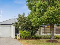  2A Robertsbridge Road  Nollamara WA 6061 Unlike most properties in this price range, this freestanding, street front house, has NO shared driveway, NO common property, NO strata fees, and NO meetings. If you’ve owned strata titled property before, I’m sure you will agree that this is a much better option! This 6 years young house has a cleverly designed floor plan, featuring open plan living areas that enjoy an outlook into the north-facing front courtyard and alfresco, and good separation between parent’s and children’s bedrooms. The inviting and spacious courtyard is light and private, and not at all hemmed-in, as the courtyards of most villas, stacked one behind the other are. The master bedroom, located at the front of the house, has an ensuite bathroom and walk-in robe. The other 2 bedrooms, each with built-in robes, are located at the back of the home, where they share a bathroom. There is direct entry into the home from the generous garage, with automatic sectional door, so there is no need to worry about safety when coming home late at night, or getting wet if it happens to be raining. A second car can be parked on the property forward of the garage. The home has high ceilings, attractive and durable vinyl timber flooring and air-conditioning in the living areas, carpet in the bedrooms, and a security alarm. 