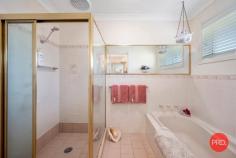 13 Pepperman Road Boambee East NSW 2452 $975,000 - $1,050,000 If you've been looking for the perfect family home in the perfect location then look no further. Offering superb street appeal this 4 bedroom home would have to be one of the best presented homes on the market. Custom designed and crafstman built approximately 30 years ago, this property has been meticulously maintained by the owners and presents as new. As you enter the home you immediately get a sense of homeliness that is often lacking in more modern homes. The floor plan is perfect for larger families and there are a multitude of living spaces including a formal lounge/dining area, family room, family dining, rumpus room plus on the upper level there is an activity space leading off the bedrooms. The bedrooms are all located on the upper level and all of them are large enough to take a King sized bed if required. The main bedroom comes complete with an ensuite and walk in robe and all of the other bedrooms have built in wardrobes. Upstairs also has fully ducted air-conditioning, an outdoor sitting area and includes the 3 way main bathroom. The rumpus room with slow combustion fireplace is the perfect spot for watching tv and relaxing and there is a 3rd bathroom leading off the ample sized laundry. As you move from the family room out to the yard area the fantastic feel of this home continues. A huge paved area is the perfect space for entertaining and there is a permanent umbrella set up so that you can entertain without having to worry about the weather. Step up to the inground pool and you begin to get an idea of how great living on over 900m2 of land can be. The yard area has also been meticulously maintained and as an added bonus there is a double garage sized workshop at the rear of the block. Positioned in one of the most desirable streets in Boambee East and only minutes drive to the beautiful Boambee Creek reserve and Sawtell beaches this property will be popular. Approximately 10 minutes drive from the Coffs Harbour CBD living here is both convenient and easy. With properties of this calibre being very rare in the current market I urge you inspect this property today as tomorrow will be too late! 
