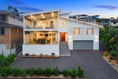  23 Prince Street Wamberal NSW 2260 Located in an elevated position with spectacular and uninterrupted beach views. This home is in one of the Central Coasts highly sought-after locations, and in one of the most desirable streets of Wamberal. Multiple indoor and outdoor living areas and extensive beach views, this home creates a lifestyle you will never need a vacation from. Offering 5 bedroom, 3 bathrooms plus a studio with plenty of parking this home is a must see! 