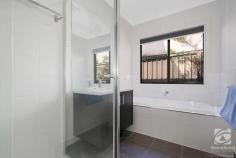  28 Clarendon Avenue Wodonga VIC 3690 $659,000 Thoughtfully designed, this prestigious home is modern yet practical and offers luxuries seldom found in suburban living. Comprising of four spacious bedrooms, all with built-in wardrobes. The master features a walk-in robe, along with additional storage at the opposite end of the room, through the walk-in robe is access to the ensuite with a shower and single vanity. Perfectly positioned central to the bedrooms and living space, the family bathroom offers a separate shower and oversize bath. The free-flowing floorplan allows seamless movement from the kitchen, dining, and living areas. A large island stone bench, 900mm cooktop and massive L shaped butlers pantry, make this kitchen perfect for entertaining. Bifold doors in the family room bring the outside in, while the covered alfresco extends the living space. Oversized established garden beds and lush green lawns are sure to keep the green thumb in the family happy. Past your back fence is a nature reserve and walking tracks, giving you the feeling of added space and tranquillity. Other notable features include split systems in every room, ducted heating, and a double lock-up garage. In a tightly held location of Wodonga, homes like these rarely come available. Don't miss this opportunity to enquire today! 