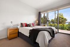  1/3 Beryl Street Warners Bay NSW 2282 Have you been searching for the perfect place to enjoy lakefront living? Here is your chance in a million to secure your own waterfront town home, one of only two, designed with the entertainer in mind. Set on three levels with phenomenal lake views on every one, this inviting home, awash with natural light, is artfully designed for family members and guests alike with masses of entertaining space on the entry level and privately located bedrooms on upper and lower floors. On entry you'll discover rich timber floors and a neutral colour palette in the ideal living/entertaining zone, the heart of which is the gleaming well-appointed kitchen with a massive 3m island bench, Blanco oven and stainless-steel appliances. Adjoining this chef's dream is the luxurious living room with double-glazed windows and sliders to a louvre-roofed waterfront balcony, a simply perfect place to unwind at the end of the day and admire the sunset over the lake. On the other side of the kitchen is a dining space with ample room for an 8-seater dining table, next to a hideaway laundry and powder room. The dining room opens to a large, enclosed tiled courtyard. You could host an alfresco party here, with guests enjoying a drink on the balcony overlooking the lake while you cook up a feast, and then moving to eat dinner in the secluded courtyard when the sun goes down. When the party's over, you can retreat upstairs to the well-proportioned, air-conditioned master bedroom that boasts stunning lake views, double length built-in robes and ensuite with shower. On the lower level, you will find two additional bedrooms, each with built-in robes, lake views and doors to a covered patio from which you can enter the front garden access the Esplanade for a brisk walk to the lake or Warners Bay Village. A study nook and family bathroom with bath and shower can also be found on this level. The two-car garage is accessed via Beryl Street, with secure entry and steps leading down to the courtyard, or alternatively you can access the home via the Esplanade. Directly opposite the alfresco courtyard is a bonus large studio/home office. This modern residence is an ideal location just a few minutes' walk to the lake, shops, supermarkets, and specialty stores as well as a great choice of cafes, restaurants and bars. During the day, take your paddle board out on the lake, or go for a bike ride to explore the waterfront cycleways, and at night head up to Brown Sugar or Canon for a few drinks to end a perfect day. All the conveniences you could possibly need are just a short stroll away. Features include: - Tri-level living, with a sophisticated design that maximises views and space - Exceptional lakefront views from living room and bedrooms that cannot be built out - Three privately located double bedrooms with views, master on upper level with ensuite and split system air-conditioning - Two bathrooms, family bathroom with bath and shower and ensuite to main, separate laundry and powder room - A choice of alfresco dining spaces - on front balcony with louvered roof and stunning views of the lake or in secluded private courtyard - Gleaming white kitchen with stainless steel appliances and 3m island bench - Bonus studio/home office space - Double garage and secure entry accessed via Beryl Street - Pedestrian access to the Esplanade for your daily walk or to browse the shops - Just a short drive up Bayview Street and you're onto the Inner City Bypass to major arterial routes. 
