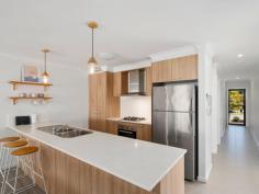  17/5 Border Drive North Currumbin Waters QLD 4223 Experience the true Gold Coast lifestyle in this well-presented 3-bedroom townhouse in one of the most popular pockets of Currumbin Waters. An open plan design combined with beachy tones and contemporary finishes makes this home modern, light and fresh. The low-maintenance outdoor patio and grassy yard makes it perfect for those looking for a carefree investment or first time home buyers alike. Highlight features include: • 3 spacious bedrooms with ceiling fans and built-in robes; master bedroom with ensuite and private balcony • Family bathroom with tub and shower • Guest toilet downstairs • Large open plan kitchen, living and dining area with fan and air conditioning • Outdoor undercover entertaining patio and grassy yard (fully fenced) • Single lockup garage with internal access • Low body corp. (approx. $45/week) • In popular Currumbin State School and PBC High School catchment. 