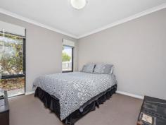  2A Robertsbridge Road  Nollamara WA 6061 Unlike most properties in this price range, this freestanding, street front house, has NO shared driveway, NO common property, NO strata fees, and NO meetings. If you’ve owned strata titled property before, I’m sure you will agree that this is a much better option! This 6 years young house has a cleverly designed floor plan, featuring open plan living areas that enjoy an outlook into the north-facing front courtyard and alfresco, and good separation between parent’s and children’s bedrooms. The inviting and spacious courtyard is light and private, and not at all hemmed-in, as the courtyards of most villas, stacked one behind the other are. The master bedroom, located at the front of the house, has an ensuite bathroom and walk-in robe. The other 2 bedrooms, each with built-in robes, are located at the back of the home, where they share a bathroom. There is direct entry into the home from the generous garage, with automatic sectional door, so there is no need to worry about safety when coming home late at night, or getting wet if it happens to be raining. A second car can be parked on the property forward of the garage. The home has high ceilings, attractive and durable vinyl timber flooring and air-conditioning in the living areas, carpet in the bedrooms, and a security alarm. 