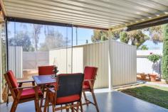  18 Carrington Street South Kalgoorlie WA 6430 $359,000 Set in the perfect location, opposite Kids on Carrington Day Care Centre, walking distance to primary and secondary schools and a stones throw from the Kalgoorlie CBD, is this lovely family home new to the market. Consisting of 4 bedrooms, the master with ensuite bathroom and walk in robe, 2 bathrooms and a beautiful mix of character with modern touches. The modern kitchen is spacious with stainless steel appliances and great storage. This is a very secure, low maintenance property with ample storage, spacious living areas, and a relaxed patio and garden area perfect for entertaining. 6x3m2 storage shed, double gates with side access to the yard for trailer storage. This property is immaculately presented, and wont last long, book your private viewing, call Martina 0417 180 103. 4 bedrooms – master with walk-in and ensuite Separate study or 5th Bedroom 2 Modern bathrooms Open plan kitchen and dining Formal living area Modern, spacious kitchen with stainless steel appliances, double pantry with lots of storage Spacious laundry Patio area perfect outdoor entertaining Extra tall double carport with 3.5m clearance, perfect for caravans, trailers and boats. Wood fire Gas heating, cooking and hot water Established gardens Security System 6x3m of outdoor storage Quality storage throughout Polished floorboards in entry, formal dining and formal living Side access with double gates Walking distance to schools, colleges and the CBD: Opposite Kids On Carrington Child Care Centre $2,226.19 p/a council rates. 