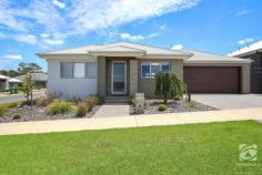  11 Hampshire Boulevard Leneva VIC 3691 $489,000 Built meticulously by Sapphire Sky Homes in 2019, this well-presented home is near to new. Save yourself the time it takes to build, and purchase an already established master built home. Well presented, this property is the ideal option for the small family, downsizer, or astute investor. With excellent tenants in a secure lease until June 2022, at $410 per week, this property is yielding well and will appeal to homeowners prepared to wait for a June move-in date. With a throughout floor plan, the living and dining area create a central hub, incorporating the stylish kitchen with stainless steel appliances, a gas cooktop, an abundance of bench space, and storage options. Comprising of three oversize bedrooms, all including built-in storage, the thoughtful design offers ideal separation and flexibility for the family. The master suite, positioned at the front of the home, enjoys views of the mountains. Complete with double built-in robes and a stylish ensuite with a large double rose shower and separate toilet. A large, pristine bathroom with a separate bath, shower, and toilet, has the family covered. Oversized, the laundry is directly accessible from the garage, making the home very functional. The double garage offers internal entry and rear yard access via a roller door. The courtyard garden is fully irrigated, with a grassed area for the kids and pets to play. A covered alfresco area located off the dining room expands your entertaining options. The front yard is fully landscaped, with low maintenance gardens and a lush green lawn. With no expense spared, this well-designed home ensures comfort all year round with ducted gas heating and evaporative cooling, a solar boosted gas hot water system, and all on a very manageable 364m2 block. 