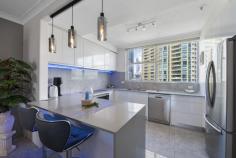  906/3422 Surfers Paradise Boulevard Surfers Paradise QLD 4217 $875,000 A great deal of pride has gone into refurbishing this stunning Golden Gate apartment! If you have missed travelling overseas, then picture yourself luxuriating in this Mediterranean inspired dwelling, right in the heart of Surfers Paradise just a hop skip and jump across from the sparkling Gold Coast shoreline. Close proximity to the boutique shops and restaurants of Main Beach and central Surfers Paradise increases the desirability of this highly sought- after building. The G link tram heading north or south is also close by. You won’t be disappointed with this immaculate and tastefully presented residence – it’s ready now for the next discerning buyer – you! • Modern Mediterranean Panache • Fully renovated to a high standard • 3 spacious bedrooms, luxurious bathrooms • Well-proportioned open plan design • Fully furnished with inspiring decor • Caesar stone benchtops • Impressive extensive tiling throughout • Approximately 130m2 on level 9, balcony breezes • Separate laundry, ducted air-conditioning Building facilities include: – • Stunning lagoon pool with open area • BBQ • Basketball court • Children’s playground. 