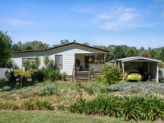  92 Great Alpine Road Myrtleford VIC 3737 $750,000 A rare opportunity to renovate, reconstruct or build on the popular tourist attraction of the Rail Trail between Myrtleford and Bright. The foundation for a renovation of the 4 bedroom, 1 bathroom property has been initiated and is looking for a new owner to see the vision and continue to make an extraordinary home or holiday rental on a large block in the perfect location. The property is elevated with stairs leading to both entrances through the back and front. This property has ample storage and a convenient layout with the living room, bedrooms, bathroom and laundry all one level and the kitchen / dining area steps down from the living room with the potential to create a large open living space with split levels. The kitchen/dining are consists of a electric cooker, dishwasher and exposed beams. Added bonus in the property is ceiling fans, wood heater & split system for all year round comfort. This property also has the added bonus of a comfortable teenagers retreat/granny flat with air conditioning in a converted garage. Land of this size is hard to come by in the township of Myrtleford and the possibilities for this property are endless. Contact us today for an inspection! 