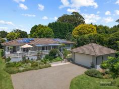  5-7 Dale St Burrawang NSW 2577 $1,995,000 - $2,100,000 Taking its place in the quaint village of Burrawang, this beautiful home is set back from the road in an elevated position and offers immense appeal to those yearning for an exceedingly comfortable, easy-care lifestyle. A recent refresh has really brought the home to life, enhancing its liveability, and reinforcing its idyllic connection to the sprawling gardens that surround it. When not entertaining friends out on the terrace or enjoying the cosy warmth of the fire, you’ll likely be sitting underneath the canopy of one of the towering maple trees in the garden, immersed in a good book with a soothing cuppa. A leisurely stroll to the main street will be a daily occurrence as you become part of this welcoming village community and relish your enviable new life. Open plan lounge and dining⎮Slow combustion stove⎮Extends to front deck Modern kitchen⎮Timber floors⎮Pantry and appliance cupboard⎮Gas cooktop⎮Dishwasher Sun-bathed front deck⎮Elevated leafy views⎮Beautiful indoor/outdoor connection Master bedroom with built-in robes⎮Built-in bookshelves⎮Reverse cycle a/c⎮Shower ensuite Second bedroom with built ins⎮Third bedroom/home office with w/c Main bathroom⎮Shower, bath, heated lighting Timber deck and paved BBQ area to the rear Ducted heating and cooling⎮Good-sized laundry⎮Bottled gas Solar panels feeding electricity and hot water Detached double lock-up garage⎮5m x 7m⎮Side access to rear Thriving veggie garden beds⎮Established gardens and trees Brick shed at the rear⎮Cute studio/second shed North-facing | 1857sqm block⎮Expansive front garden Walk to Burrawang Hotel and General Store. 