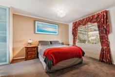  5 Taketa Crescent Frankston VIC 3199 $700,000 - $770,000 Boasting a striking cosmopolitan aesthetic paired with some charming classic details, families will adore this space, style and lifestyle convenience of this four bedroom home in paces of Karingal Hub. Instantly appealing, beyond the formal entry the single-level layout features a light-filled open plan living area with polished timber floors, plantation shutters and a split system for the winter evenings. A glamorous scarlet glass splashback defines the modern kitchen, which is sleek and stylish with a stacked stone island bench, teardrop pendants, stainless-steel appliances, laminate countertops and a frosted glass pantry, while timber French doors swing open to a covered alfresco patio spilling onto a private garden. Cleverly configured down a separate hall to allow for evening serenity, the four bedrooms share a full family bathroom and master ensuite in this comfortable home, which includes a dishwasher and tandem garage/shed. A short walk to restaurants, cinemas, major shopping, recreational facilities, Ballam Park Primary School and McClelland College, the home is located on a 559m2 (approx) allotment abutting the cycling path of the Peninsula Link Trail. Should you require any further information, please do not hesitate to contact Daniel Condon on 0438 866 486 or Shane Teo on 0426 277 138 anytime. 