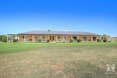  54 Bullington Way Baranduda VIC 3691 $1,350,000 Located in the picturesque Baranduda Valley, only minutes from town, this spacious home was built with the growing family in mind. With its inviting street appeal, this owner-built, 2013 steel-framed home is situated on 5 acres and offers a total lifestyle package. Designed for those who enjoy entertaining, the contemporary kitchen is complete with a central benchtop, ample storage options, twin wall & steam oven, and a large walk-in pantry. The two luxurious living areas with a naturally flowing floor plan ensure a seamless transition to the kitchen and dining areas, bringing the whole family together, while still ensuring there is a quiet space for everyone. Comprising of four generous bedrooms, the master with a huge walk-in robe and ensuite, you will never be short on space! The rumpus room positioned at the far end of the home provides for flexibility of use. This room could serve as a third living area for a long-term guest, a home office/study, or a children's playroom. Indoor-outdoor living and dining are made easy, with the outstanding 7x6m covered alfresco area opening directly off the dining room, providing a great space for those summer nights and weekends spent with family and friends. This property truly embraces the countryside's private tranquil lifestyle, while still only being 10 mins drive to town. Enjoying city conveniences, with all town services connected, plus two water tanks to irrigate the lovely garden beds. In addition, there is a 12x12m shed with three-phase power, a mezzanine, and an extra high central roller door to store all the family toys, hay shed, and fenced paddocks. Inside, satellite NBN ensures your ability to work/study from home, while R5 insulation batts and double glazed windows in the living area assist the ducted heating and cooling to ensure your comfort year-round. Become a part of the coveted Baranduda community, and enjoy all of the amazing facilities available to you, such as shops, schools, and walking trails. Life doesn't get much better than this! Please call to arrange your inspection time. 