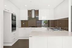  18/3-15 Belmore Street Wollongong NSW 2500 $775,000 - $815,000 More like a townhouse than an apartment, this quality residence offers a modern lifestyle to inspire. Beautifully equipped with a generous interior layout and sunny entertainers' courtyard, it provides a haven of carefree comfort enhanced by sleek floating floors, reverse-cycle air conditioning, and a huge double garage with connecting door. Two bedrooms reside upstairs and are accompanied by a family- friendly bathroom and separate laundry. Peaceful and position-perfect, this superb home enjoys momentary access to cafes and restaurants, mall shopping, nightlife and all CBD conveniences. Features: Fantastic opportunity boasting direct entrance from street Combined lounge/dining flows to easy-care enclosed courtyard House-sized kitchen features gas cooking + stone benchtops Carpeted bedrooms with built-in wardrobes and shared balcony Full bath plus guest W/C, storage area in DLUG, complex pool Short walk to pubs, bars + clubs, less than 1km to station. 