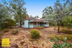  1 Lillie Street Kalamunda WA 6076 $750,000 A massive opportunity here! Close to town, on a HUGE 2800 sqm flat, corner block with rentable timber 3 bedroom house plus workshop / garage. With a possibility to live in the cottage whilst you build a new home or retain as ancillary dwelling (subject to all Local and State approvals) Gas available and services connected. Opportunities like this are hard to find especially in this location. This is a rare offering and buyers who know the quality of blocks like this will be impressed! Act now as this will be a popular attraction. 